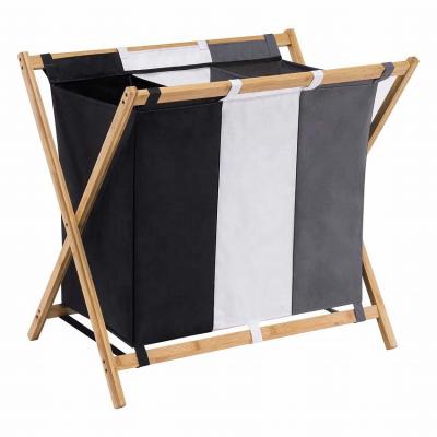 China New Factory Folding Frame Laundry Hamper Custom Waterproof Bamboo Hamper With 3 Compartments for sale