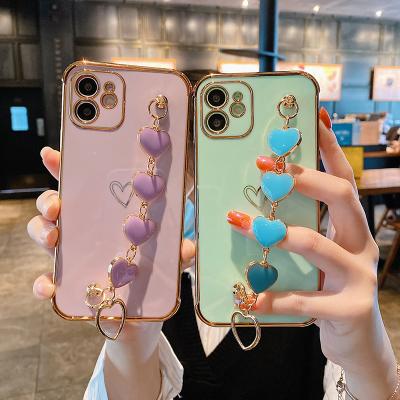 China Love Heart Shockproof Luxury Plated Phone Case With Hand Strap For iPhone 12 Pro 11 XS Max for sale