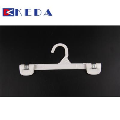 China OEM High Quality Pant Cut To Hold Pants Plastic Legging Hanger for sale