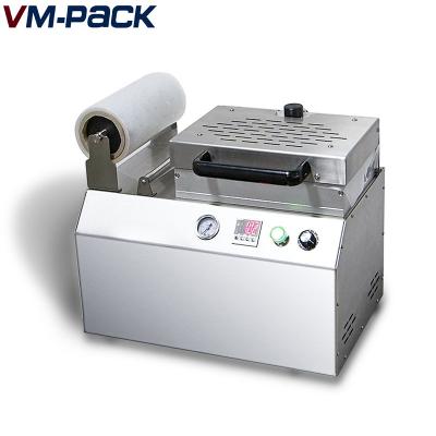 China Food Tray Sealer Vacuum Skin Packaging Machine for Fresh Meat and Seafood with CE for sale