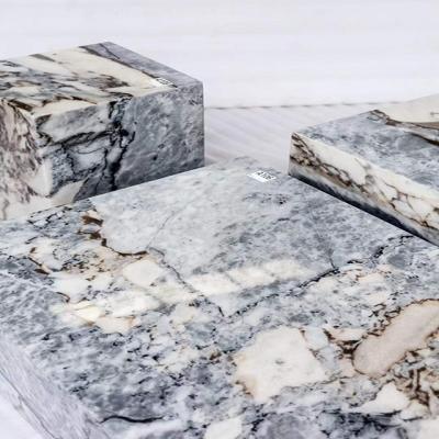 China Modern Elephant white Customized Natural Pisos de Marmol Italian Stone Marble Polished Forest for sale