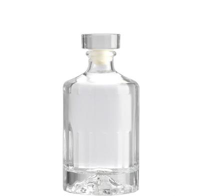 China Wishing 750ml Wholesale Round Clear Empty Glass Vodka Spirit Bottle Juniper Liquor Bottle With Rum Cork Cap for sale