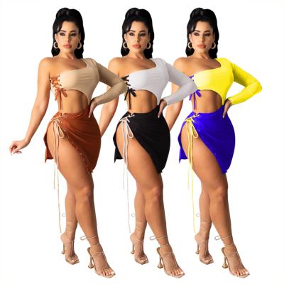 China New arrivals breathable 2021 summer one shoulder lace up skirt bandage slit top two piece set latest for sale