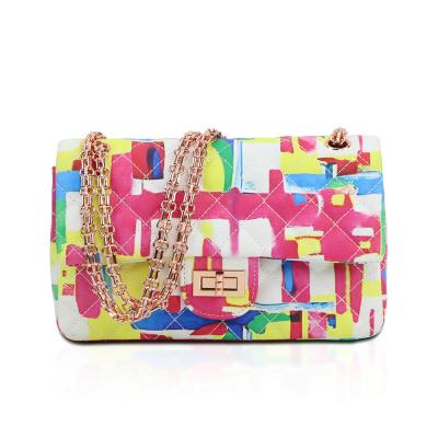 China Fashoion 2021 color graffiti jelly package CIA personality trend letters printing ling little one shoulder bags askew big size handbag for sale