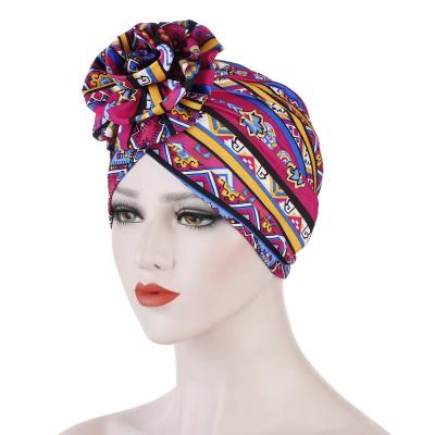 China FENNYSUN Daily Life Boho Turban Flower Head Wrap Beanie Scarf Hair Loss Hat for Muslim New Amazon Women Men and Women for sale