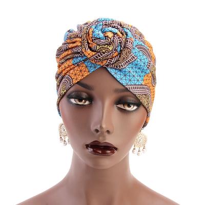 China FENNYSUN Daily Life Fashion Hijab Hat Muslim Women Flower Head Wind Vortex Knot Scarf Wrap Turban Hat for sale