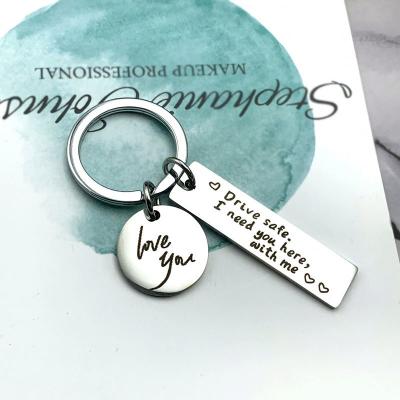 China 2022 Environmental Friendly New Creative Key Chain Drive Safe I Need You Here With Me Man Key Chain Bags Boy Letter Color Key Ring Alloy Pendant Brelok for sale