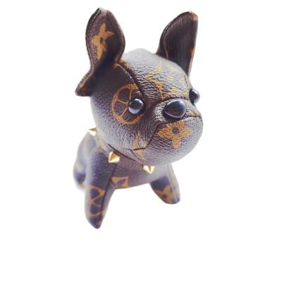 China Method Leather Off-The-Shelf Leather Dog Products Figure Backpack Fighting Key Chain Hanging Ornaments for sale