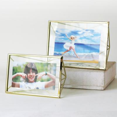 China Gold Luminous Metal Picture Frame Family Photo Frame Brother And Sister Handmade Plated Glass Photo Frame for sale