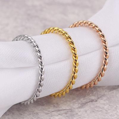 China New Fashion Trendy Jewelry Titanium Steel Thin Twist Couple Rings Personalized Stainless Steel Thin Rings for sale