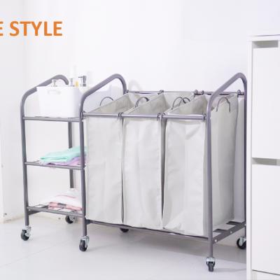 China New Customized Minimalist Style Oxford Bag Laundry Sorter With Wheel And Storage Shelf for sale