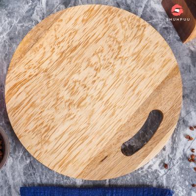 China Viable Kitchen Medium Size Wholesale 10 Inch Acacia Wood Round Cut Cutting Board With Convenient Hole for sale