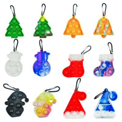 China Silicone Mini Christmas Series Santa Claus Stress Release Noise Toy Keychain Christmas Gift for sale