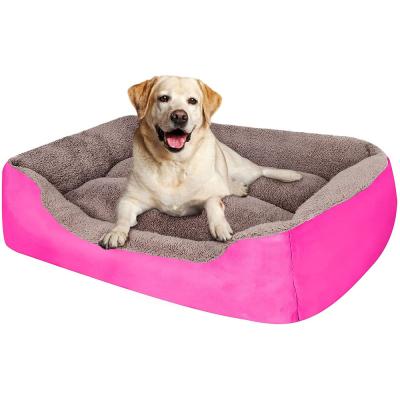 China Faux Fur Donut Warming Cozy Washable Soft Dog Cat Bed For Large Dog Warm Round Customized Plush Christmas Soothing Fluffy Meow for sale