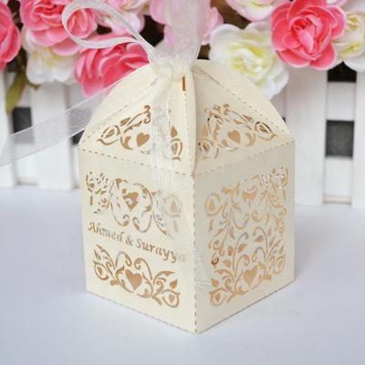 China Custom Love Vines Paper Laser Cut Ivory Wedding Favors Gift Box for sale