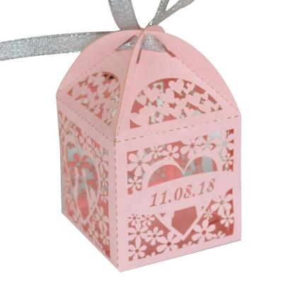 China Candy/cake/sweet/chocolate/gift customize wedding favor box wedding decoration paper crafts cavity laser cut wedding door gift box for sale