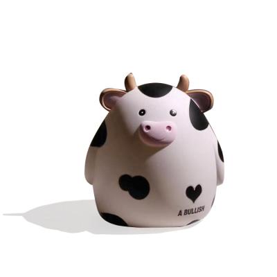 China Cute Cartoon Hot Selling Unbreakable plastic piggy bank Cartoon Cow piggy bank for kids for sale