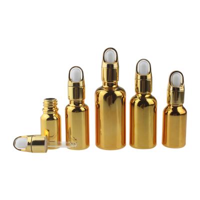 China Glass bottle with droppers 20ml empty cosmetic dropper bottle, 20ml gold glass bottle with faucet hook dropper cap, essential oil dropper glass bottle for sale