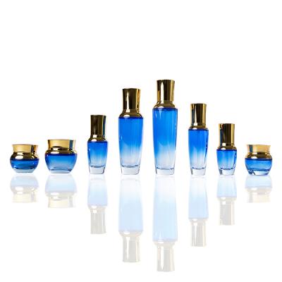 China Pump Glass Packaging Glass Bottle Cosmetic Packaging, 30ml Blue Base Glass Bottle For Cosmetic Packaging, 1oz Lotion Cosmetic Glass Bottle for sale