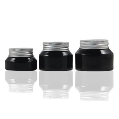 China 15g 30g 50g black skin care glass jar, wholesale cosmetic glass bottle cream jar with aluminum cap for sale