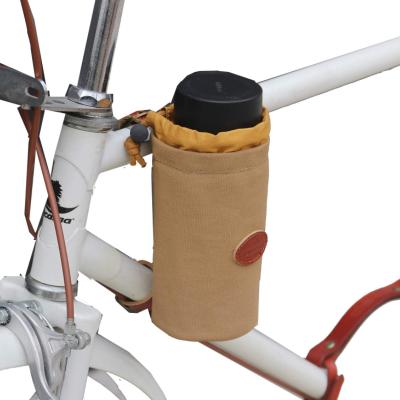 China Handmade Bicyle Bottle Holder Canvas and Leather Bicycle Water Bottle Cup Holder Wine Carrier for sale