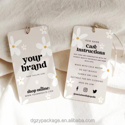 China Price Tags Thick Luxury Hang Tags Embossed Hangtags For Clothing for sale