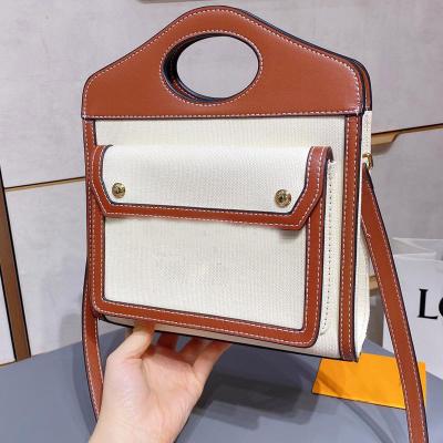 China Lady Simple Shoulder Tote Bags Canvas Leather Bag Fashion Classic Luxury Style Messenger Designers Motion Sensing Women's Handbag Letter for sale