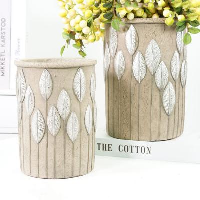 China Unique Home Decor Eco-friendly Concrete Vintage Cylinder Plant Cylinder Cement Design Relief Leaf Chinese Flower Vase For Decoration for sale