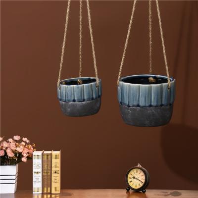 China Wholesale Custom Eco-Friendly Home Decor Ceramic Round Hanging Pot Planters Balcony Hanging Flower Pot for sale