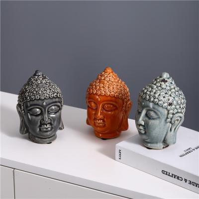 China Creative Eco-friendly Statue Table Decor Head Buddha Design Ceramic Buddha Statue For Home Decor for sale