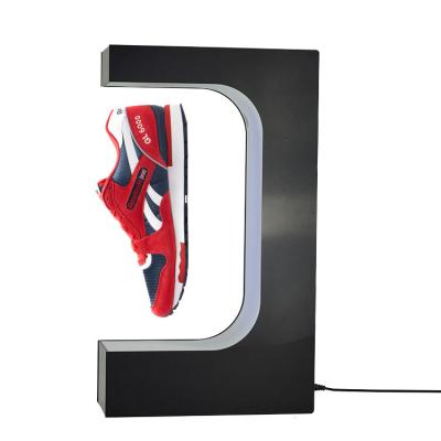 China Magnetic Floating Display Product Showcase Magnet Levitating Shoe Sneaker Display Rack Stand Rotatable for sale