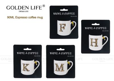 中国 まっすぐな形の磁器のコーヒー・マグの手紙F K M Hのヒョウの印刷物色 販売のため