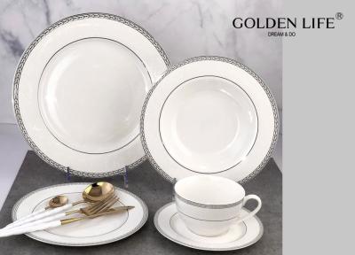 China Sistema de cerámica del servicio de mesa de la cocina 20-Piece, placas, cuencos, tazas, servicio para 4, plata con grabado en relieve en venta