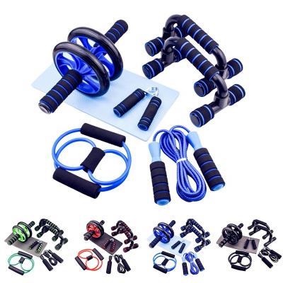 China Multifunctional Home Gym Abdominal Exerciser 7 in 1 Ab Wheel Roller Kit with Resistance Bands Knee Pad Jump Rope Pump Bar and Hand Gripper for sale