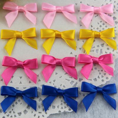 China Viable sale pre made mini pink ribbons and bows for lingerie decoration for sale