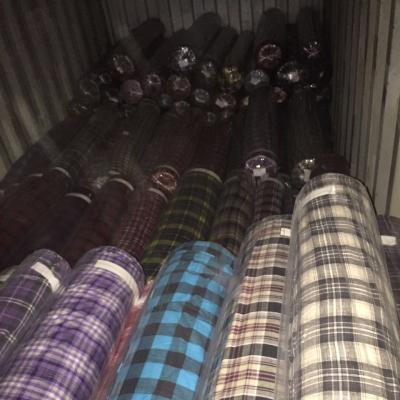 China Blackout 100%cotton Yarn-dyed Cheap Tartan Fabric Pampers Shirt Combed Yarn 100% Cotton Vietnam Market Current Market DYE Garment Plain Weave for sale