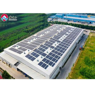 China Modern Electricity Saving Solar Panel On Roof Steel Structure Warehouse Metal Workshop Building for sale