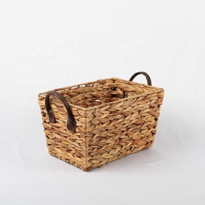 China Fashion household viable debris woven storage basket with handle straw grass basket hanmper water hyacinth basket with iron shelf for sale