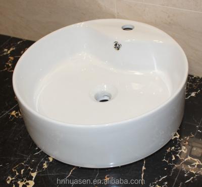 China Shampoo Sinks Bathroom Stock Round Shape Ceramic Type Vanity Wash Basin For Hotel (HAB-13) for sale