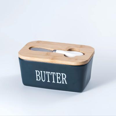 China Freshness Preservation Hot Selling Eco Friendly 650ml multi color Large Butter Dish Ceramic Dish Butter Storage Container with bamboo lid and knife for sale