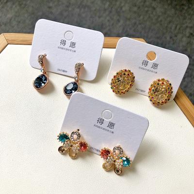 China Simple PUSHI flowers and small animals are raw crystal beautiful earrings new fancy earrings mixed drop earrings wholesale for sale