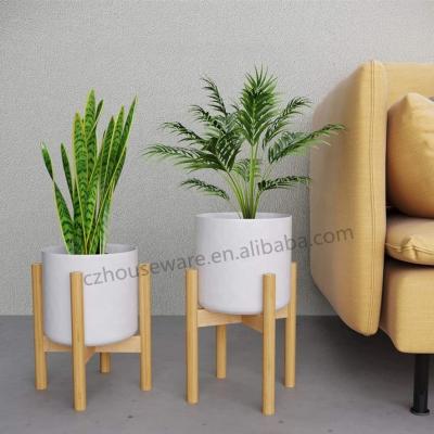 China Modern Adjustable Durable Low Price Planter Stand Bamboo Plant Stand for sale