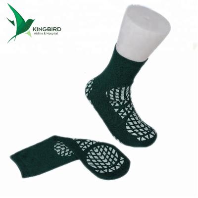 China Anti-slip colorful cotton and polyester blend anti-slip socks for airline for sale