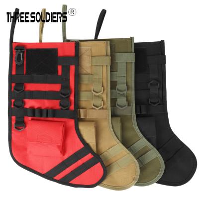 China Christamas Home Decoration Gift Bag Tactical Christmas Stocking With Hot Popular Wholesale Black Green Camouflage OEM New Polyester Molle Printing Western Sea PVC Item Patch for sale