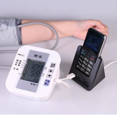 China Medical Phone with GPS WiFi Real Time Tracking USB Stand Charger Collect Health Data From Blood Pressure Monitor device for sale