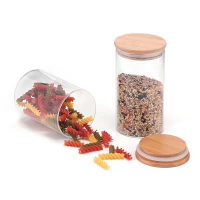 China Sustainable Small Round Kitchen Borosilicate Glass Spice Jars With Bamboo Lids Set for sale