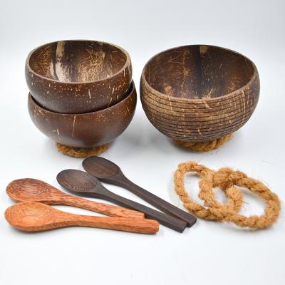 China Sustainable Handmade Organic Wooden Coconut Bowl Shell With Stand And Wooden Spoon Sets for sale