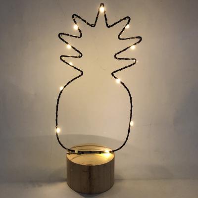 China Pineapple decoration light wood base with metal copper wire lights for sale