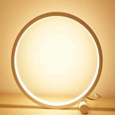 China Eco-friendly Modern Minimalist Warm Light Bedroom Decor Dimmable Round Circle Office Desk Led Table Lamp zu verkaufen