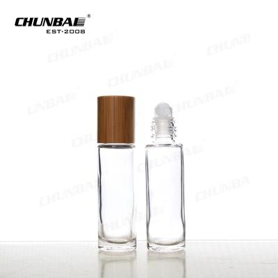 China Arab 10 Ml 30 Ml 50ml 90ml Roll On Frosted Clear Perfume Oil Glass Leak Proof Roll-On Bottle Wooden Cap en venta